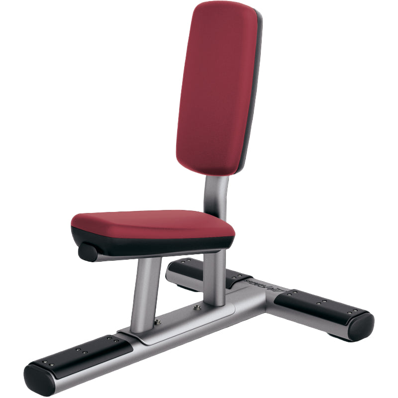 Gym bench with red seat and backrest on a white background