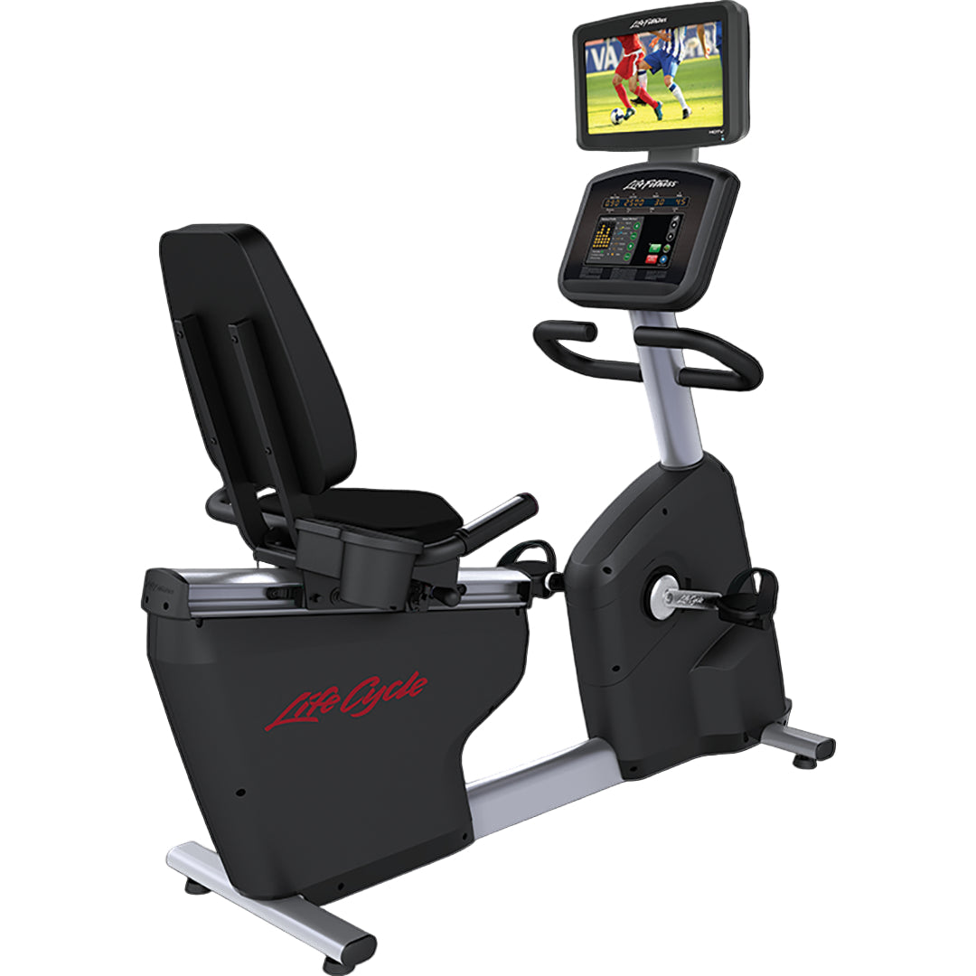 Recumbent exercise bike with a screen displaying a video game on a black background