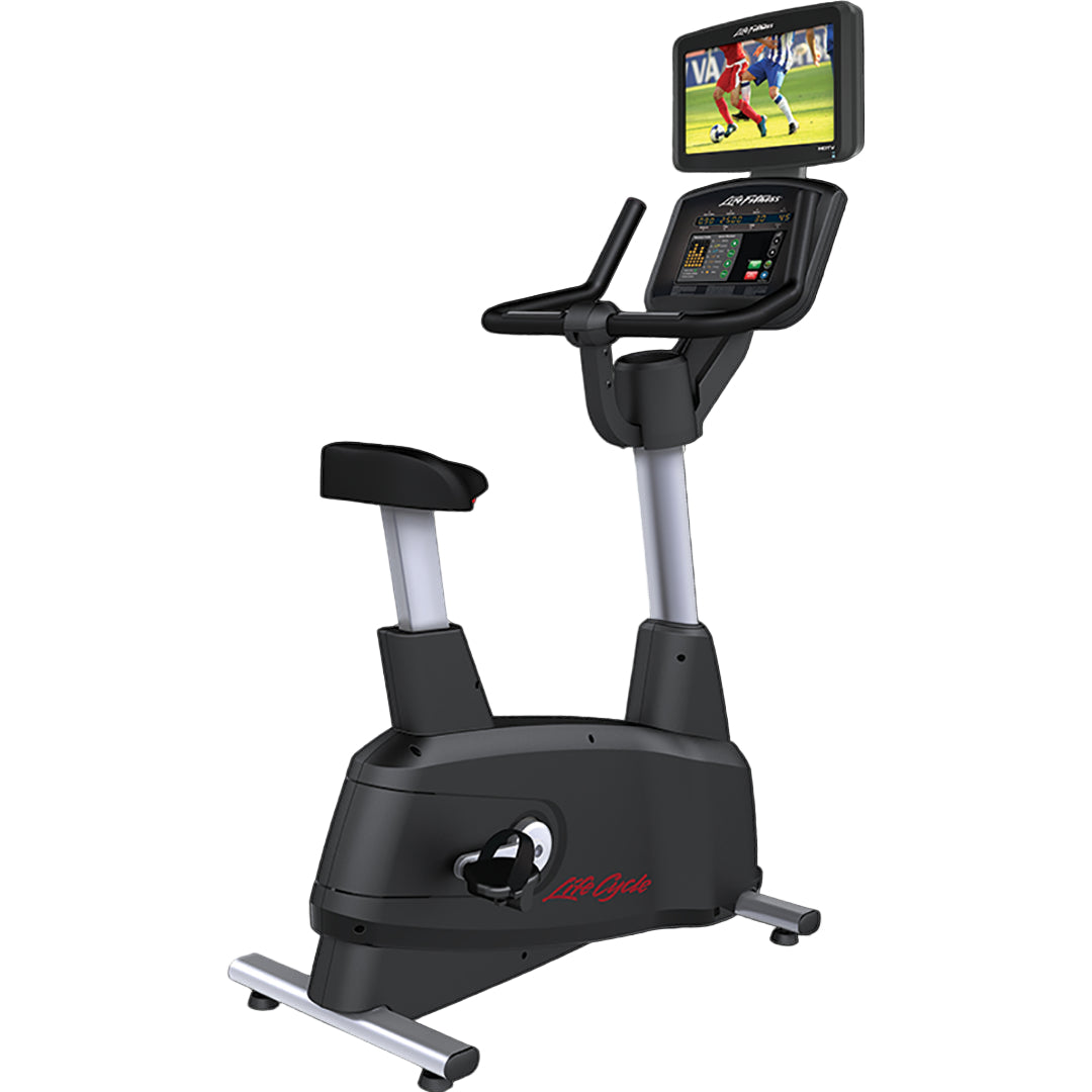 Upright exercise bike with a screen displaying a video game on a white background