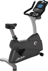 Upright bike with digital display on a black background