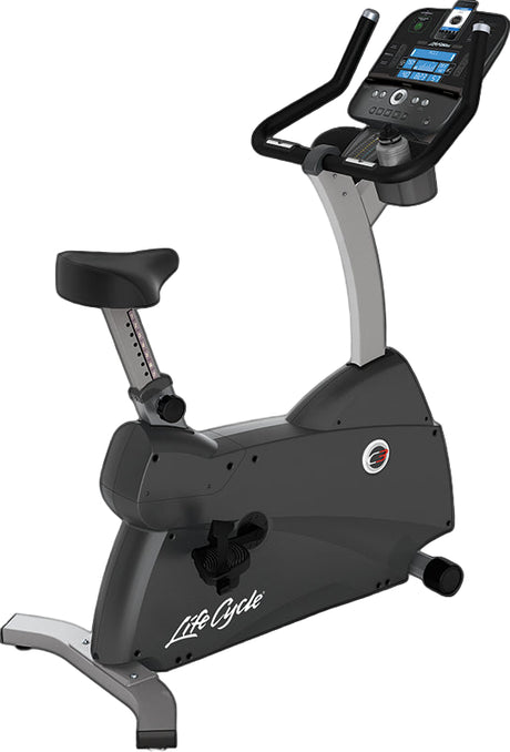 Upright bike with digital display on a black background