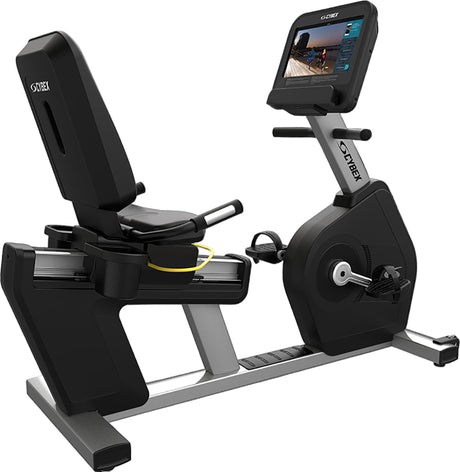 Recumbent bike with a screen displaying a workout app