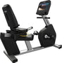 Recumbent bike with a screen displaying a workout app